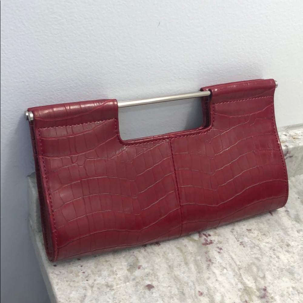 Red leather clutch